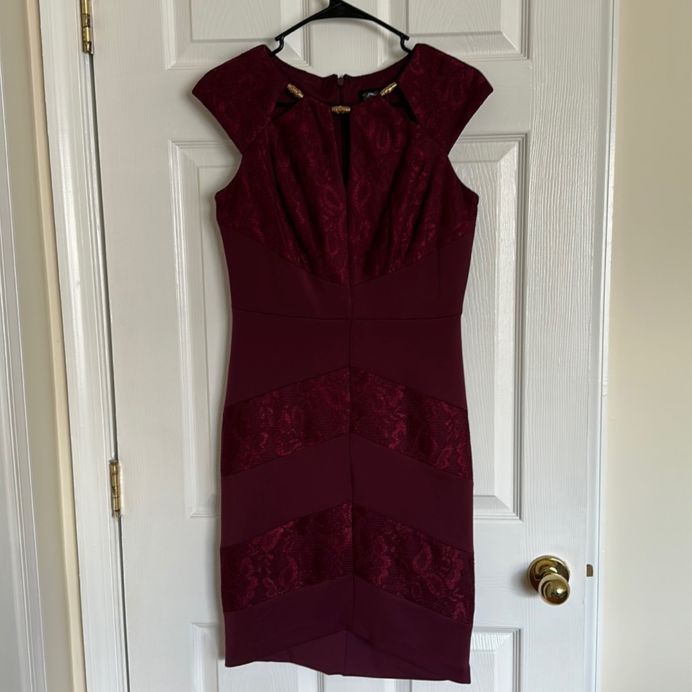 Burgundy dress, with gold beads at top